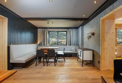 Ein Sitzbereich in der Unterkunft Ferienalm Panorama Hotel