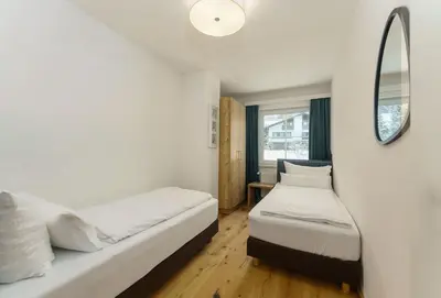 Ein Bett oder Betten in einem Zimmer der Unterkunft Appartements Landhaus Hubertus Wellness & Breakfast