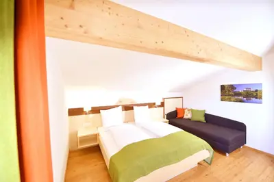 Ein Bett oder Betten in einem Zimmer der Unterkunft Appartements Kolb