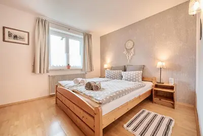 Ein Bett oder Betten in einem Zimmer der Unterkunft Bungalow Nr. 33 - Die Ferienwohnung