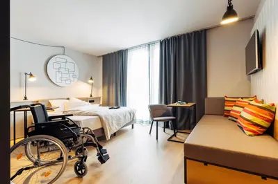 Ein Bett oder Betten in einem Zimmer der Unterkunft harry's home Bischofshofen hotel & apartments