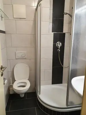 Ein Badezimmer in der Unterkunft TownVille