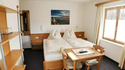 Ein Bett oder Betten in einem Zimmer der Unterkunft Haus Holzer