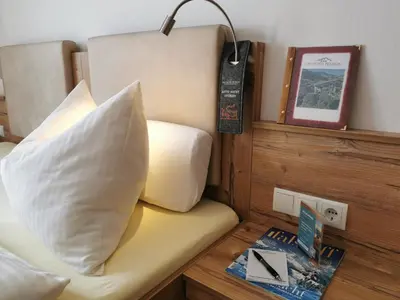 Ein Bett oder Betten in einem Zimmer der Unterkunft Hotelpension Oberauer Wagrain
