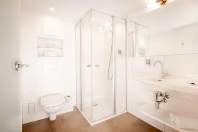 Ein Badezimmer in der Unterkunft Landhotel Stofflerwirt