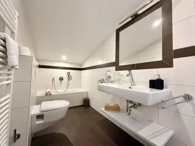 Ein Badezimmer in der Unterkunft Boutique Hotel Alpenhof