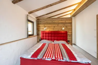 Ein Bett oder Betten in einem Zimmer der Unterkunft Almdorf Auszeit Fageralm