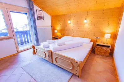 Ein Bett oder Betten in einem Zimmer der Unterkunft Bergidyll 11 by Alpenidyll Apartments