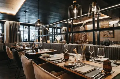 Ein Restaurant oder anderes Speiselokal in der Unterkunft JOHANN Schladming