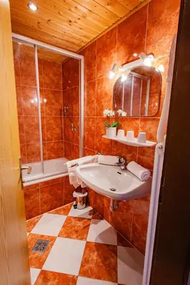 Ein Badezimmer in der Unterkunft Bergidyll 6 by Alpenidyll Apartments