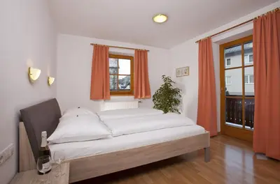 Ein Bett oder Betten in einem Zimmer der Unterkunft Appartementhaus Erasim