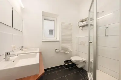 Ein Badezimmer in der Unterkunft Appartement Tamino - City Appartement by Schladmingurlaub
