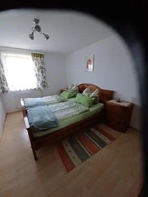 Ein Bett oder Betten in einem Zimmer der Unterkunft Bergruhe