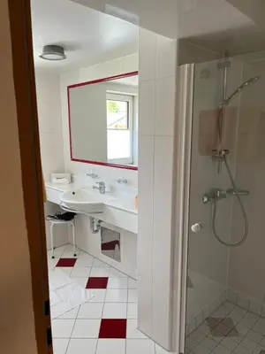 Ein Badezimmer in der Unterkunft Appartements-Restaurant Schwaiger