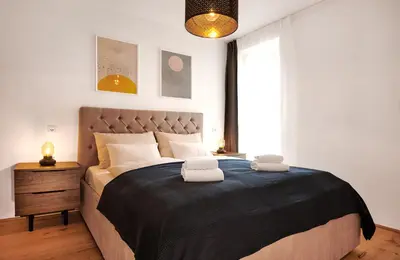 Ein Bett oder Betten in einem Zimmer der Unterkunft Adler Lodge D5