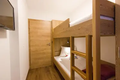 Ein Bett oder Betten in einem Zimmer der Unterkunft Reinthalers