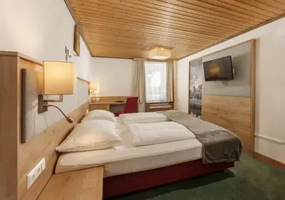Ein Bett oder Betten in einem Zimmer der Unterkunft Kirchenwirt Schladming