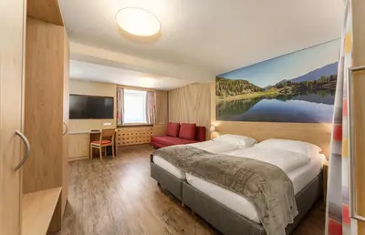 Ein Bett oder Betten in einem Zimmer der Unterkunft Kirchenwirt Schladming