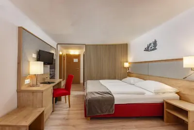 Ein Bett oder Betten in einem Zimmer der Unterkunft Kirchenwirt Schladming