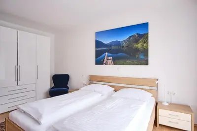 Ein Bett oder Betten in einem Zimmer der Unterkunft Appartements Das Charlie