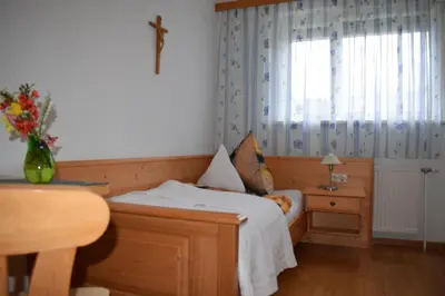 Ein Bett oder Betten in einem Zimmer der Unterkunft Frühstückspension Josefinum