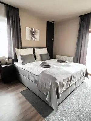 Ein Bett oder Betten in einem Zimmer der Unterkunft The Steakhouse - Guest Rooms