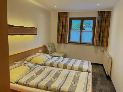 Ein Bett oder Betten in einem Zimmer der Unterkunft Haus Wagrain
