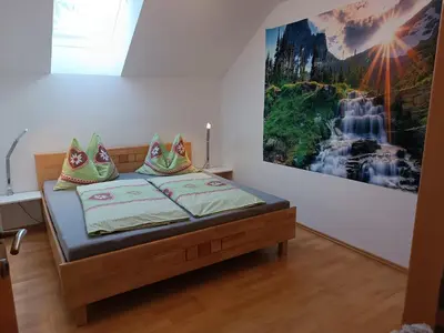 Ein Bett oder Betten in einem Zimmer der Unterkunft Hintererhof