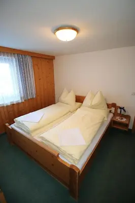 Ein Bett oder Betten in einem Zimmer der Unterkunft Liftgasthof Appartements