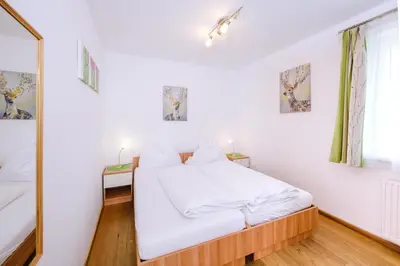 Ein Bett oder Betten in einem Zimmer der Unterkunft Brückenwirt's Ferienwohnung