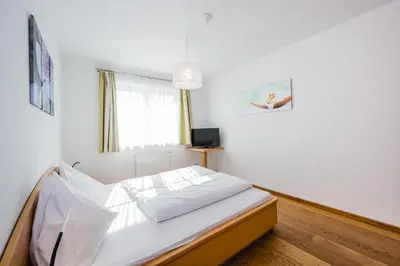 Ein Bett oder Betten in einem Zimmer der Unterkunft Brückenwirt's Ferienwohnung