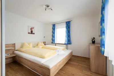 Ein Bett oder Betten in einem Zimmer der Unterkunft Hotel-Restaurant Stefanihof