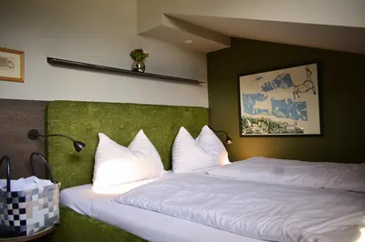Ein Bett oder Betten in einem Zimmer der Unterkunft Seehotel Berau