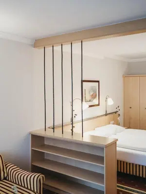 Ein Bett oder Betten in einem Zimmer der Unterkunft Sporthotel Royer