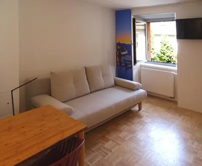 Ein Sitzbereich in der Unterkunft Convenient and Functional Apartment in the Center