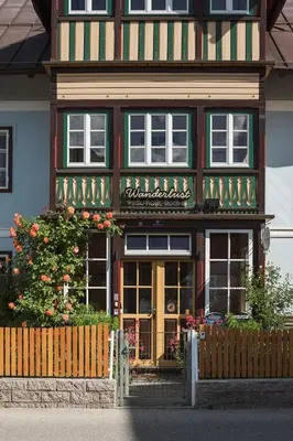 Eine Fassade oder ein Eingang zu Wanderlust Boutique Rooms