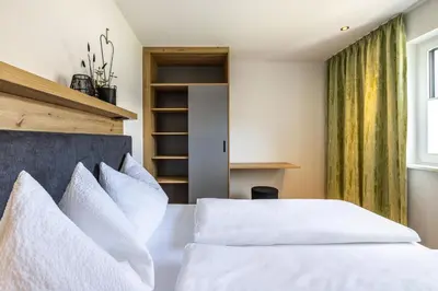 Ein Bett oder Betten in einem Zimmer der Unterkunft Appartements Evers