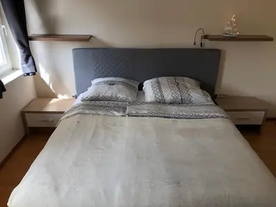 Ein Bett oder Betten in einem Zimmer der Unterkunft Ferienwohnung Stiftsgartenblick