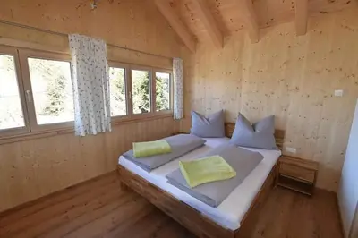 Ein Bett oder Betten in einem Zimmer der Unterkunft Ferienwohnungen Kalss nahe Altaussee