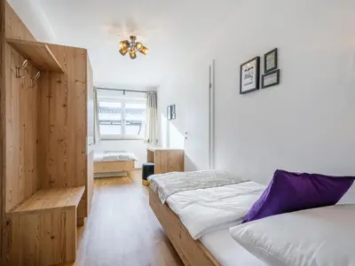 Ein Bett oder Betten in einem Zimmer der Unterkunft Tauern-Blick