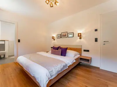 Ein Bett oder Betten in einem Zimmer der Unterkunft Tauern-Blick