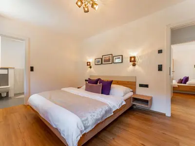 Ein Bett oder Betten in einem Zimmer der Unterkunft Tauern-Blick
