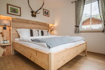 Ein Bett oder Betten in einem Zimmer der Unterkunft Ferienwohnungen Villa Salzweg