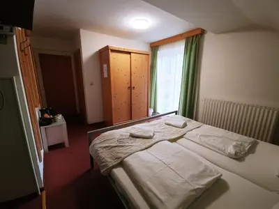 Ein Bett oder Betten in einem Zimmer der Unterkunft Apartment House Seerose self check-in