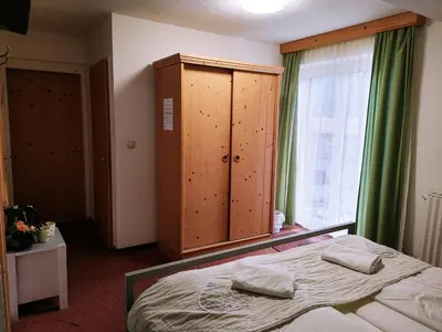 Ein Bett oder Betten in einem Zimmer der Unterkunft Apartment House Seerose self check-in