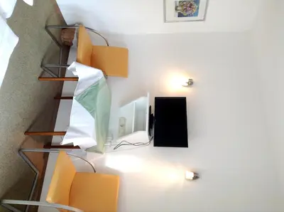 Ein Bett oder Betten in einem Zimmer der Unterkunft Parkpension Billroth