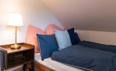Ein Bett oder Betten in einem Zimmer der Unterkunft Ferienwohnung Flora Altaussee - Your Austrian Home