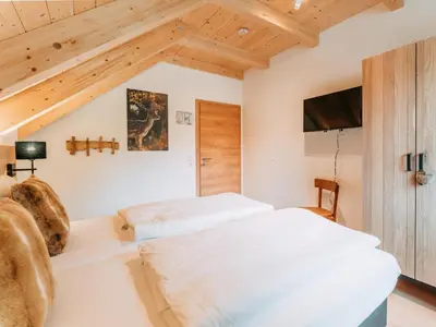 Ein Bett oder Betten in einem Zimmer der Unterkunft Chalet Norah