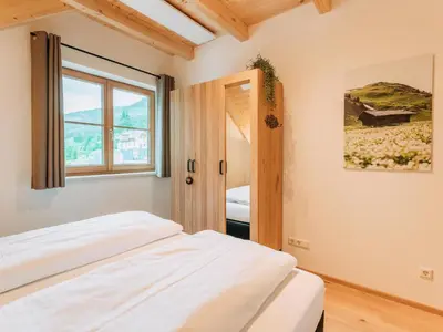 Ein Bett oder Betten in einem Zimmer der Unterkunft Chalet Norah