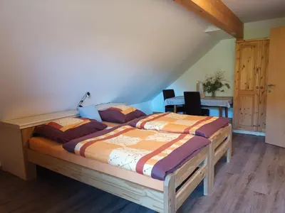 Ein Bett oder Betten in einem Zimmer der Unterkunft Zeit-/Los Quilk